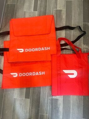 2 DoorDash pizza bags and 1 food bag